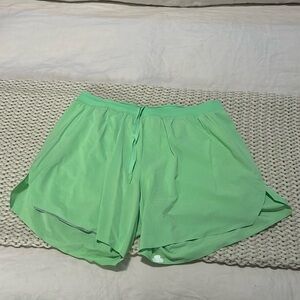 Men’s Lululemon Fast and Free short. Size Large. 6” inseam. Lined. Lime green